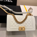 CHANEL BOY BAG MEDIUM 25 WHITE CAVIAR GOLD HARDWARE