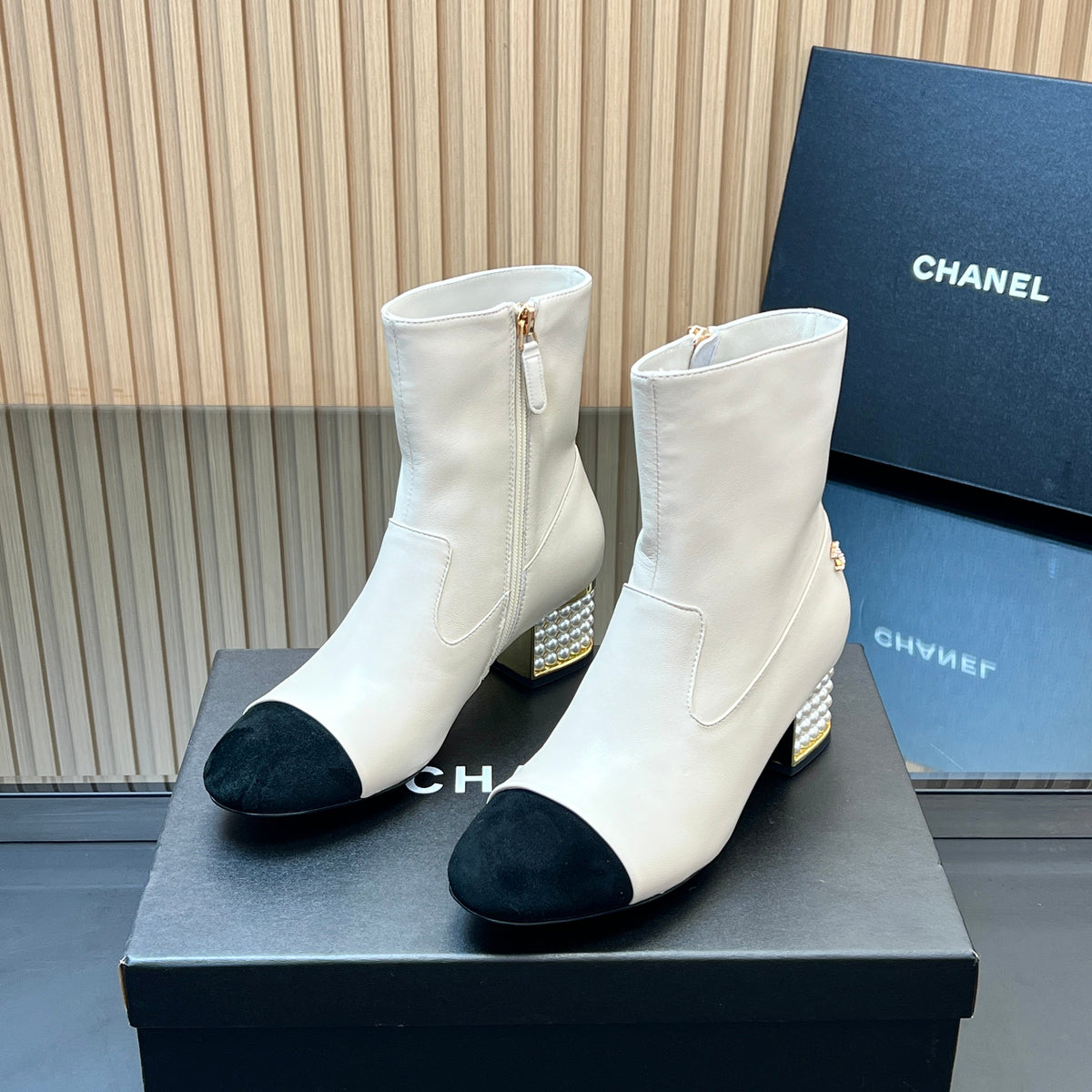 CHANEL 25S TALL BOOTS WITH PEARL DETAILS 50MM IN WHITE CALFSKIN AND BLACK SUEDE