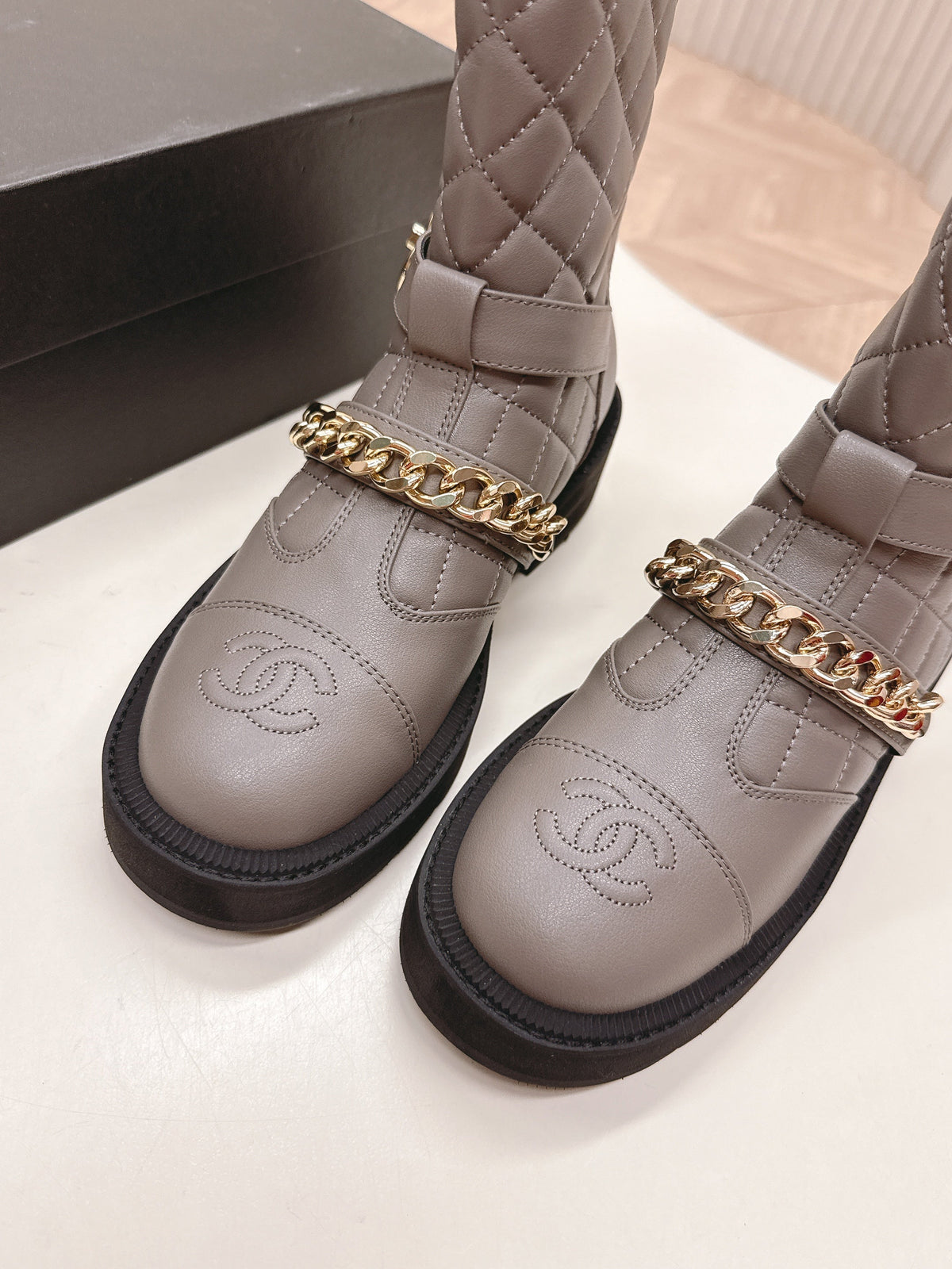 CHANEL ANKLE BOOTS 25S IN SMOKY GREY LAMBSKIN EMBOSSED LOGO WITH GOLD HARDWARE