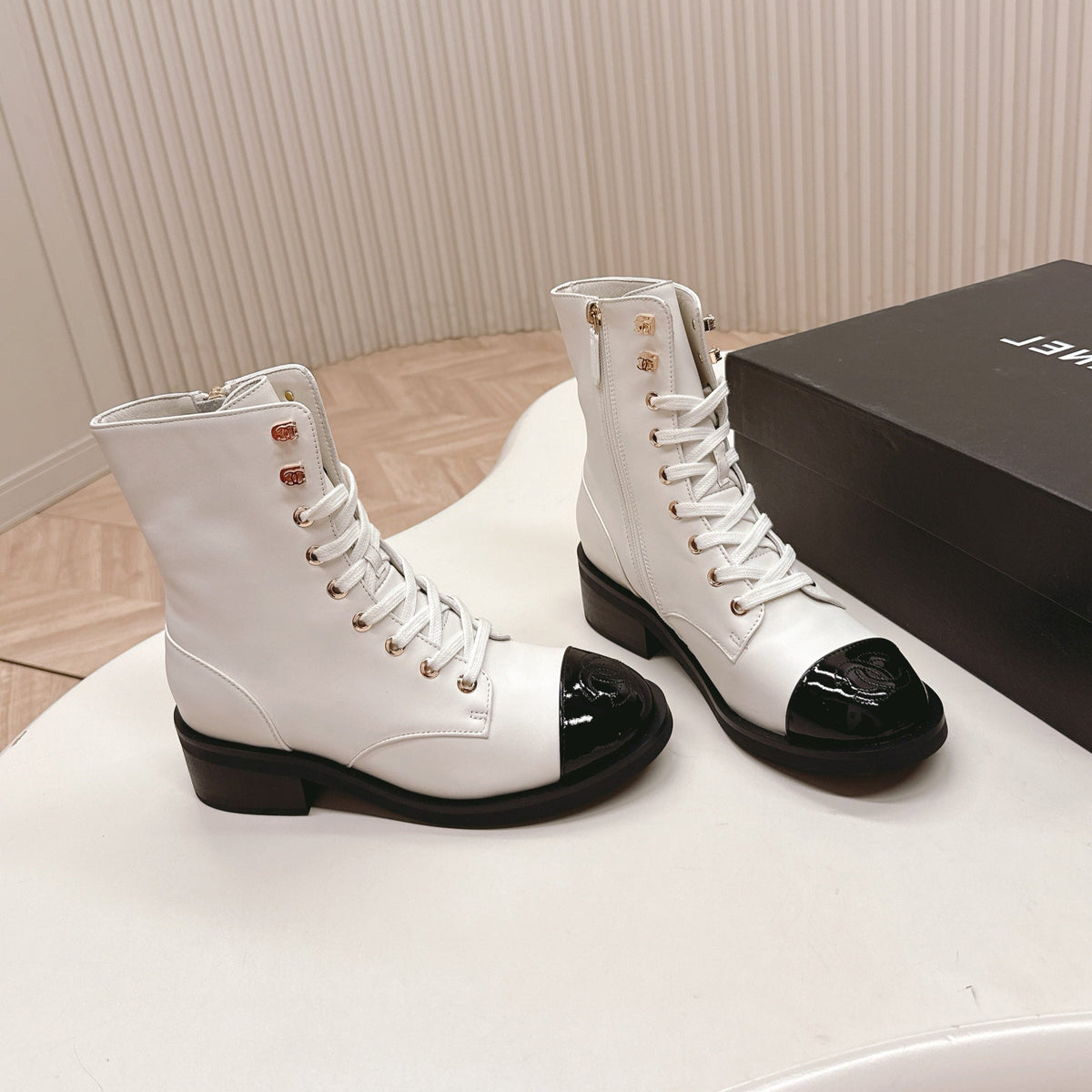 CHANEL ANKLE BOOTS 25S IN WHITE MIX BLACK LAMBSKIN WITH ZIPPER
