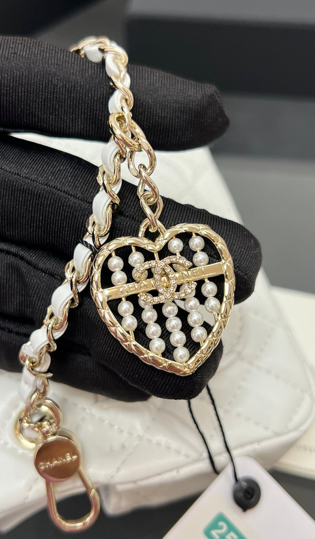 CHANEL 25S FLAP CHARM BAG 13 IN WHITE LAMBSKIN