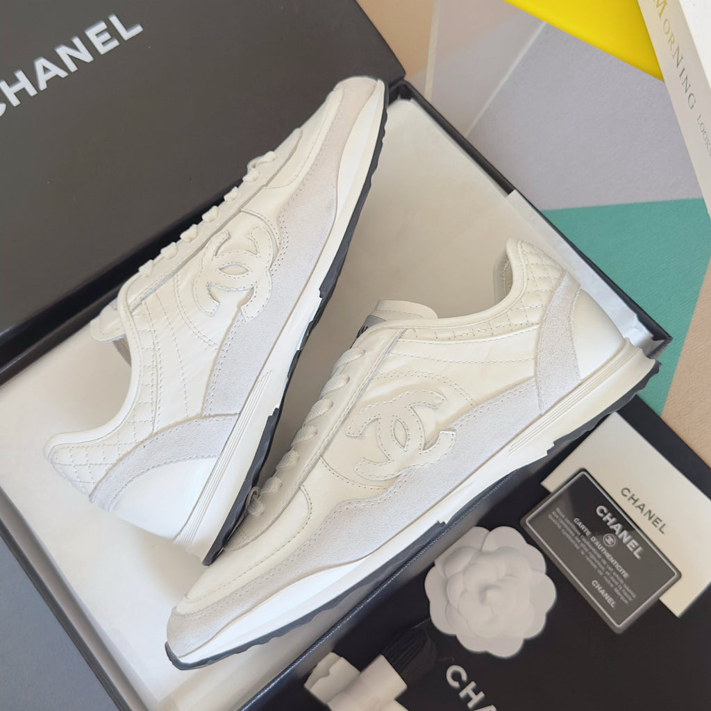 CHANEL 25S SNEAKERS 20MM IN WHITE CALFSKIN