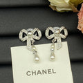 18K  Chanel Butterfly Pearl Earrings