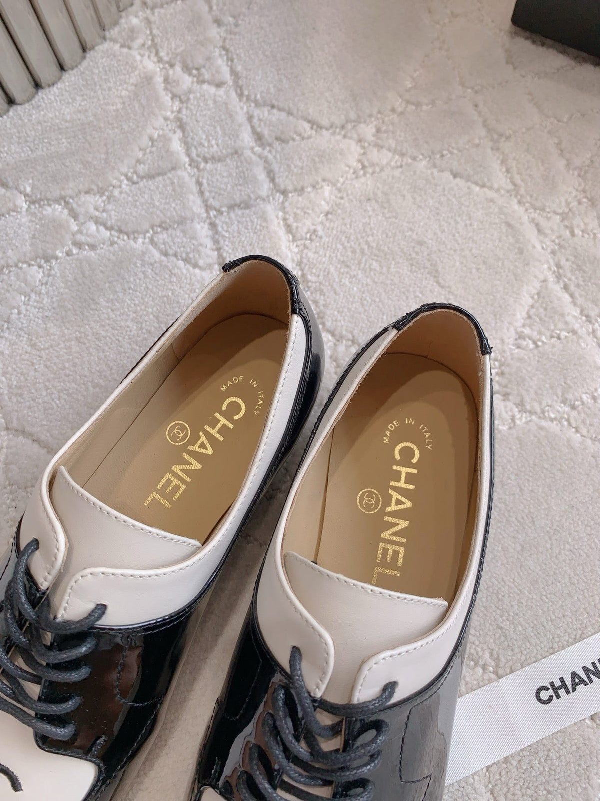 CHANEL 25S TWO TONE LACE UP IN BLACK AND WHITE SHINY CALFSKIN