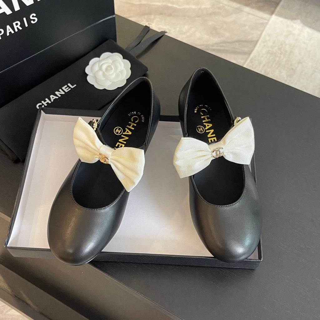 CHANEL BALLET FLAT BLACK LAMBSKIN WITH WHITE BOW