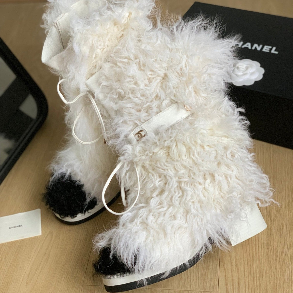 CHANEL ANKLE HIGH BOOTS IN WHITE MIX BLACK WOOL FUR